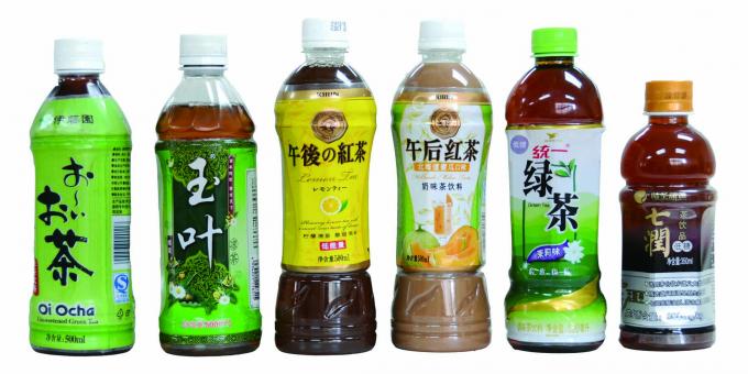 To sider flaske Automatisk krympemuffe applikator til mineralvand